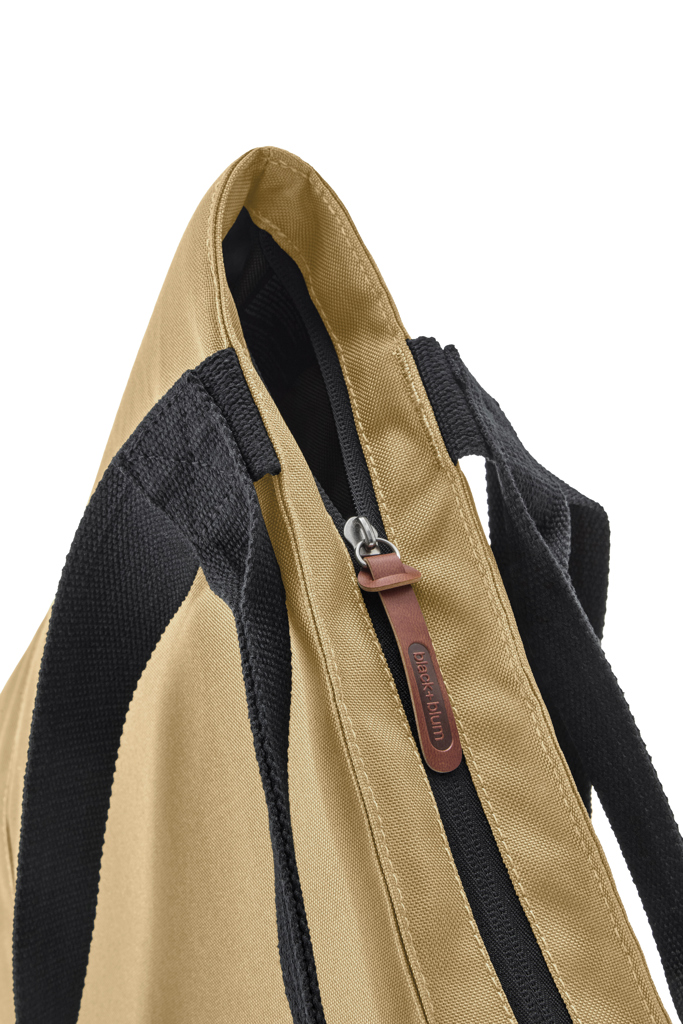 Sac beige avec fermeture éclair et anses noires