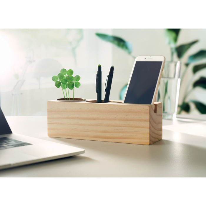 Organisateur de bureau en bois avec plante et smartphone