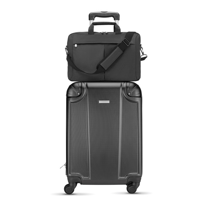 Valise noire avec sac assorti sur le dessus