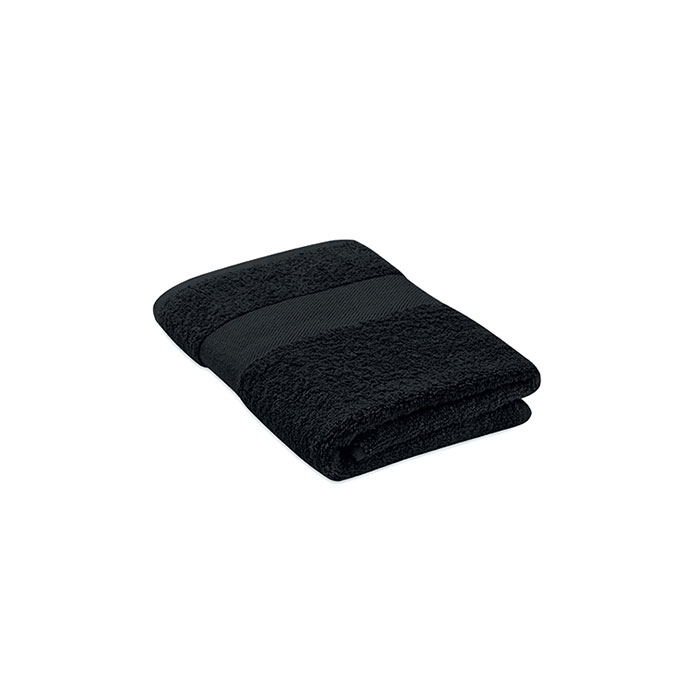 Serviette de bain noire pliée
