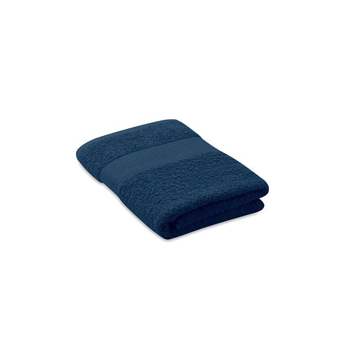 Serviette de bain bleue pliée