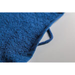 Serviette bleue en tissu éponge
