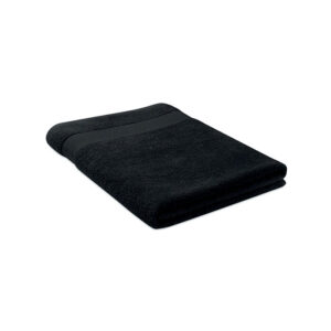 Serviette de bain noire pliée en coton