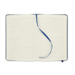 Carnet ouvert avec ruban bleu