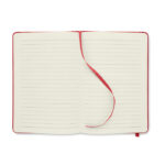 Carnet ouvert à pages lignées avec ruban rouge