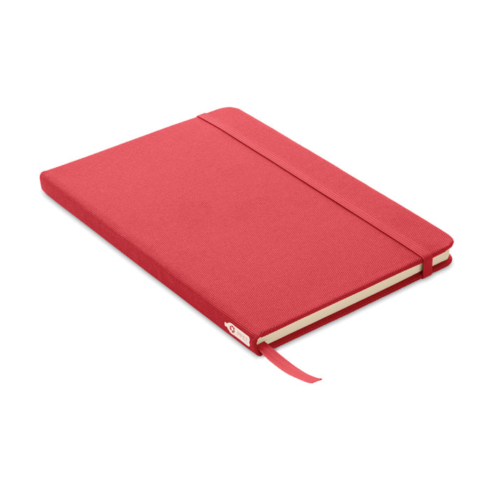 Carnet rouge fermé avec élastique.