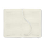 Carnet ouvert à pages lignées blanches
