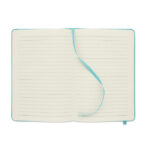 Carnet ouvert à pages lignées avec marque-page bleu