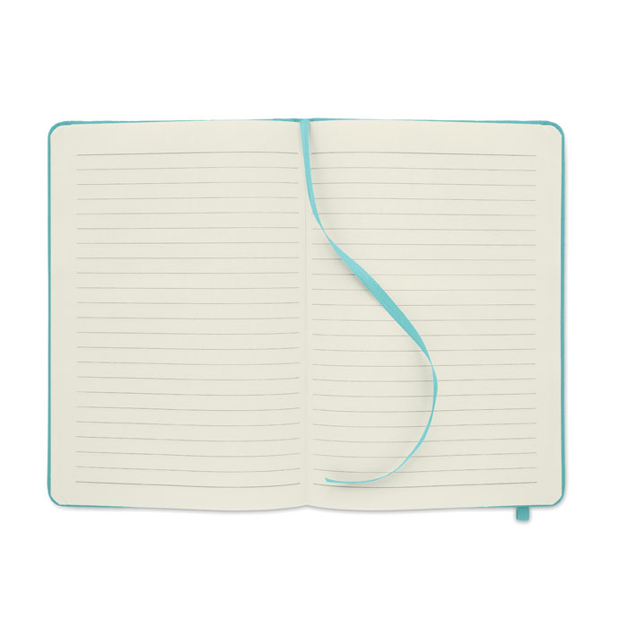 Carnet ouvert à pages lignées avec marque-page bleu