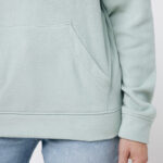 Sweat à capuche vert clair et jean bleu