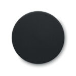 Couvercle rond noir sur fond blanc