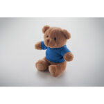 Ourson en peluche marron avec pull bleu.