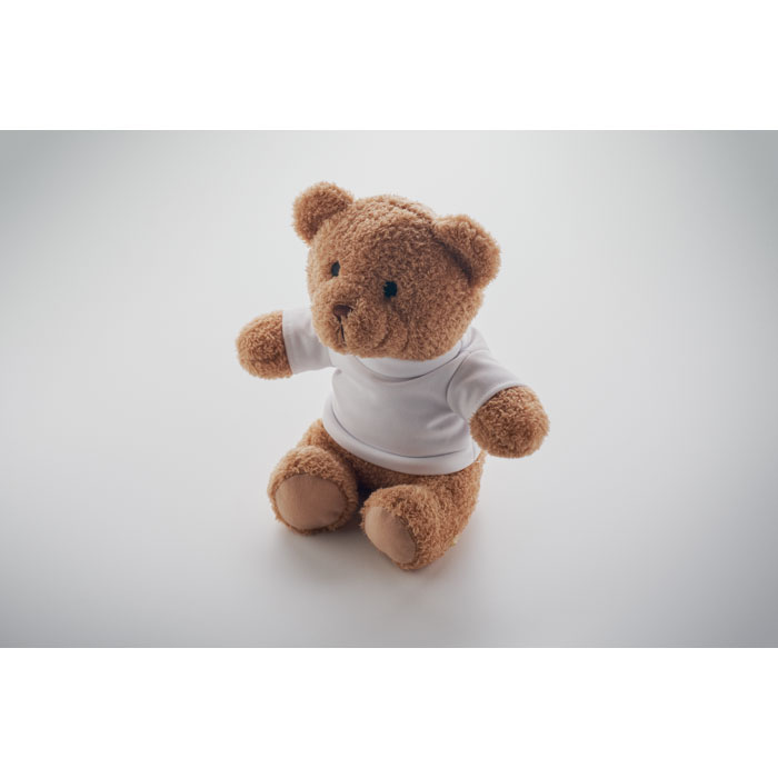 Ourson en peluche marron portant un t-shirt blanc