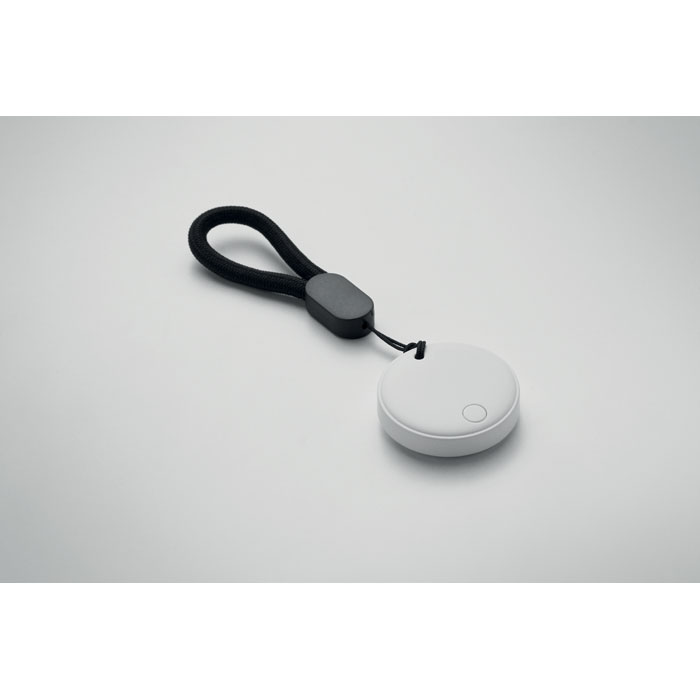 Petit dispositif rond avec cordon noir