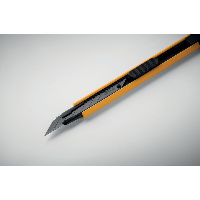 Cutter de précision à lame rétractable jaune et noire