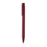 Stylo à bille rouge bordeaux sur fond blanc