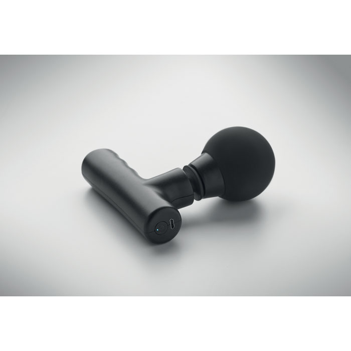 Pistolet de massage noir sur fond gris