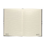 Carnet ouvert à pages lignées blanches