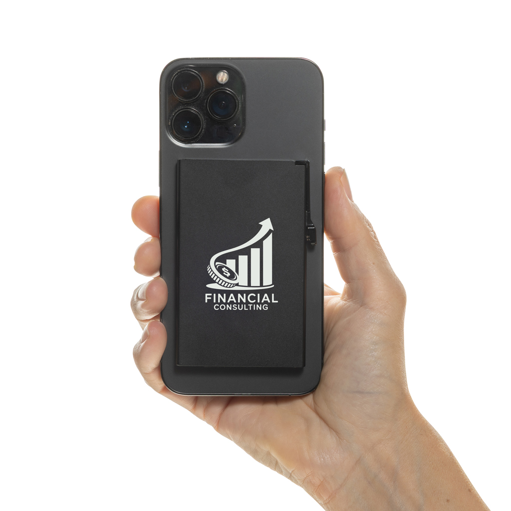 Main tenant un smartphone avec support noir