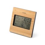 Station météo numérique en bois affichant 10h03