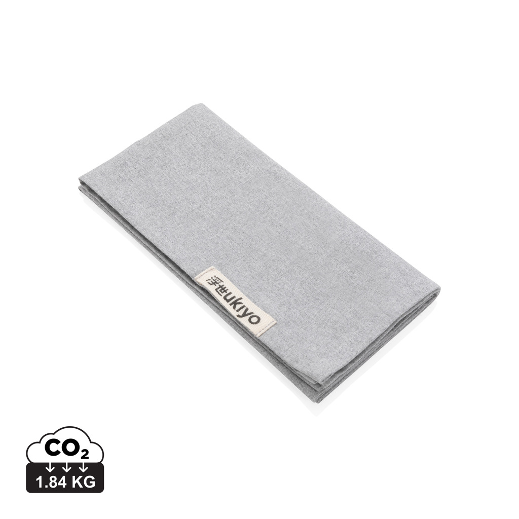 Serviette en tissu grise pliée avec étiquette Ukiyo