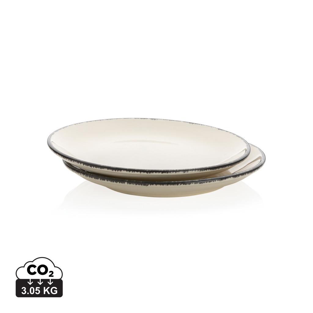 Deux assiettes en céramique beige empilées