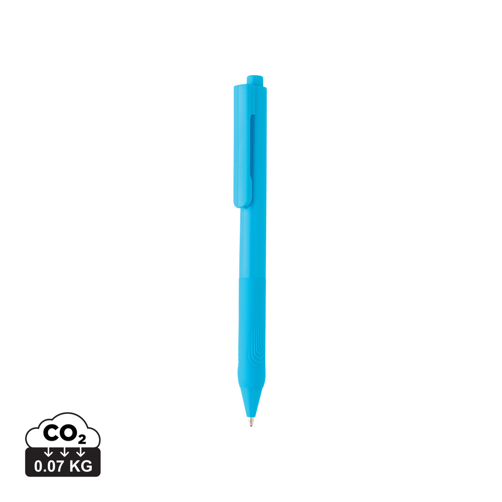 Stylo bille bleu sur fond blanc