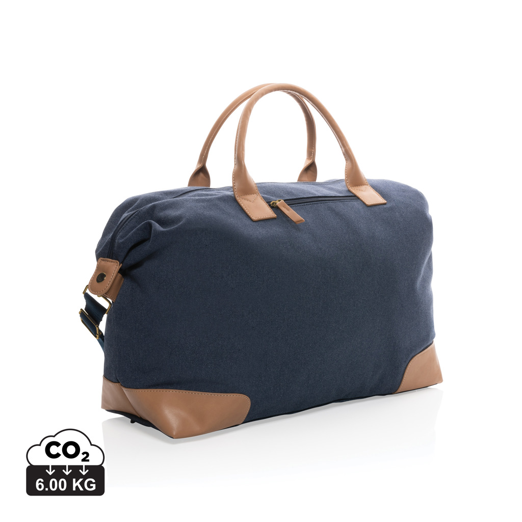 Sac de voyage bleu en toile et cuir