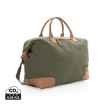 Sac de voyage vert en toile et cuir