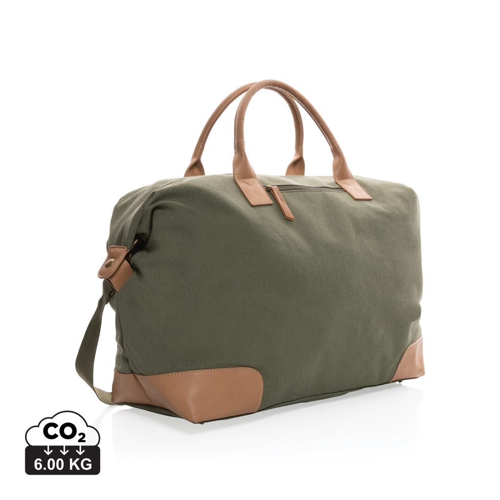 Sac de voyage vert en toile et cuir