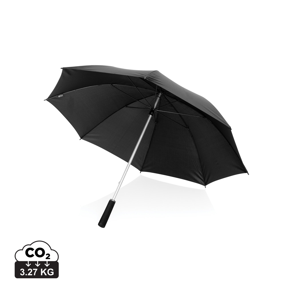 Parapluie noir ouvert sur fond blanc