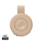 Appareil rond beige avec sangle intégrée