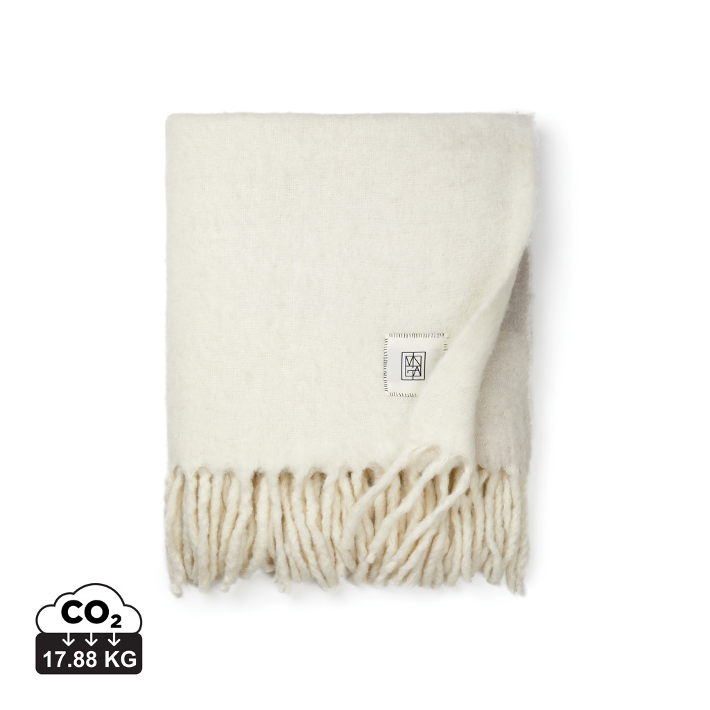 Plaid crème à franges plié