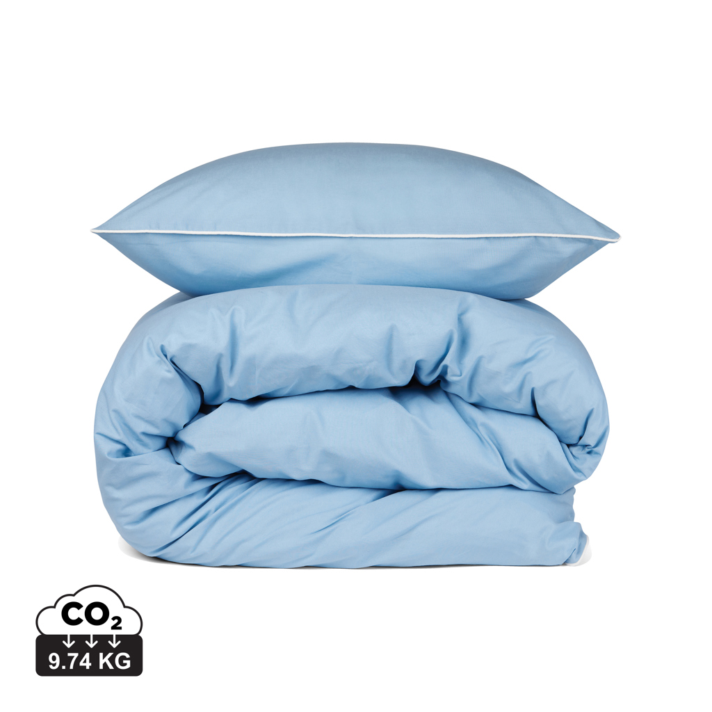 Oreiller et couette bleus avec empreinte carbone
