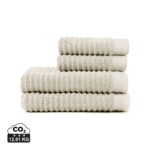 Pile de serviettes beiges avec indicateur CO2