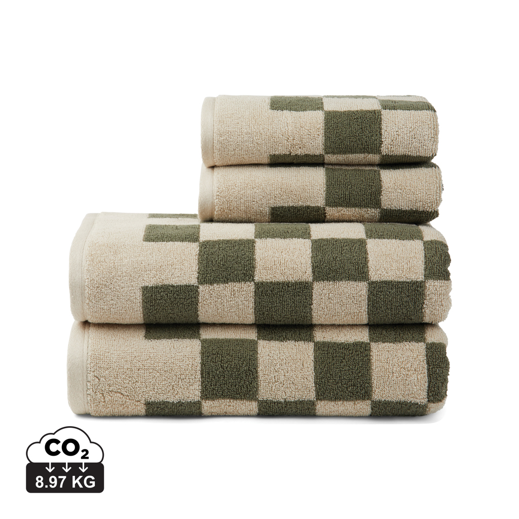 Pile de serviettes à carreaux vert et beige