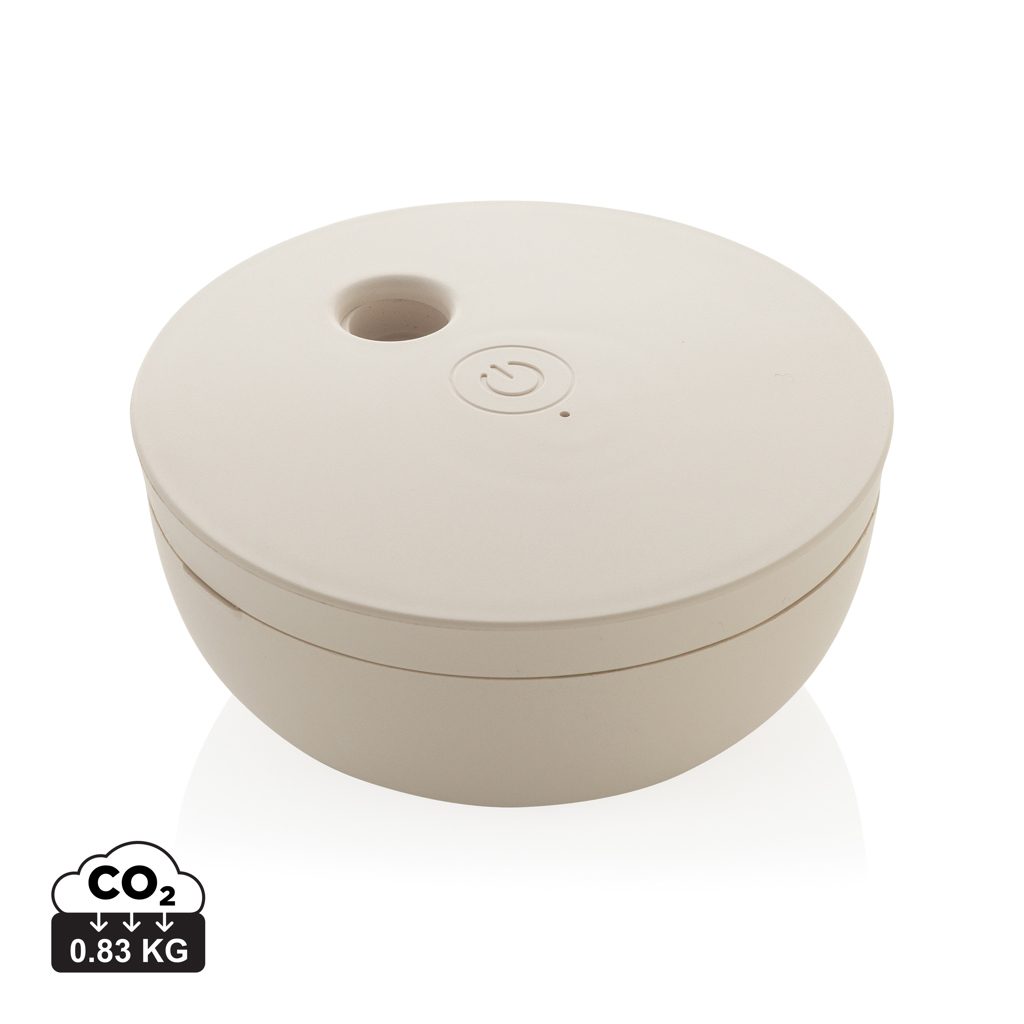 Petit humidificateur rond beige avec bouton marche