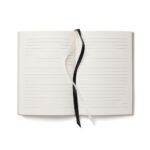 Carnet ouvert avec rubans noir et blanc